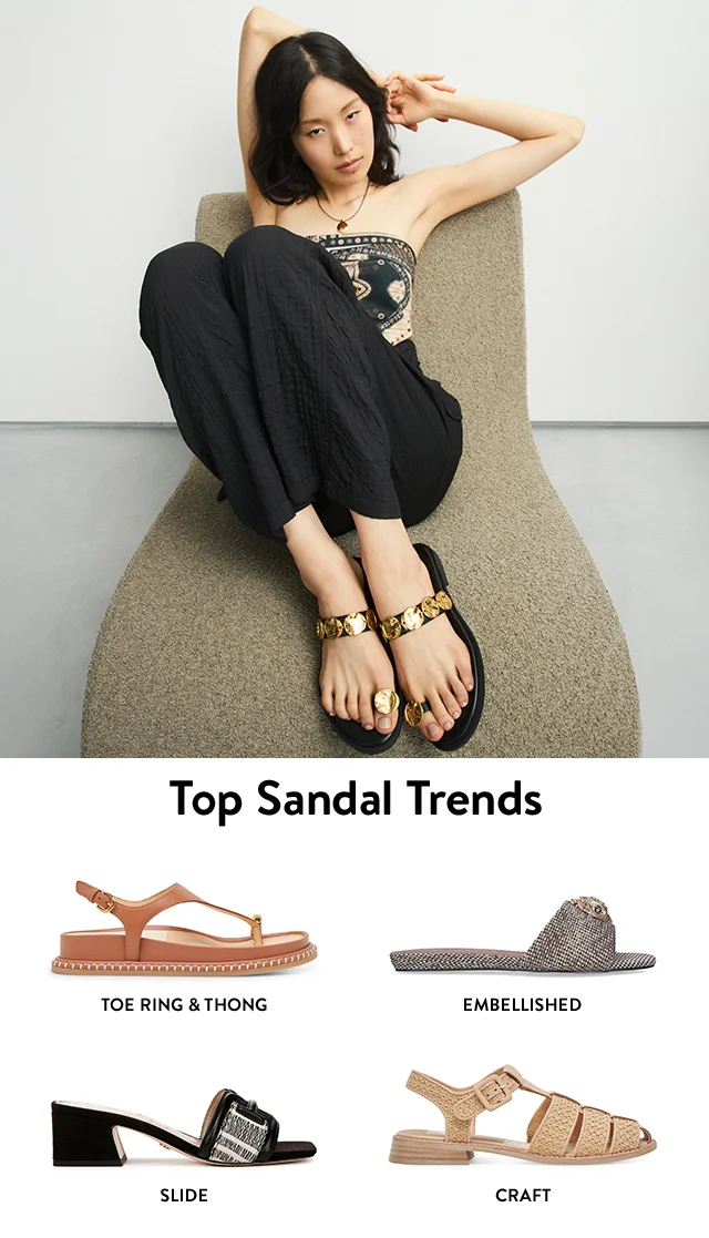A woman wearing toe-ring sandals. A toe-ring sandal, hardware-embellished slide, black and white slide and woven sandal.