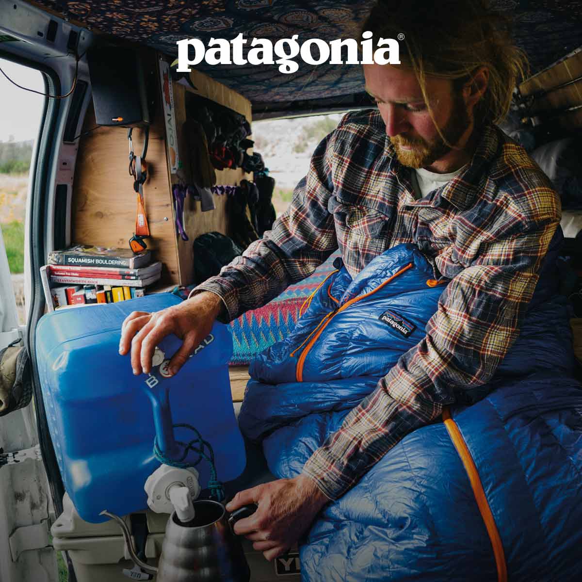 Patagonia. A person in a sleeping bag filling a kettle.