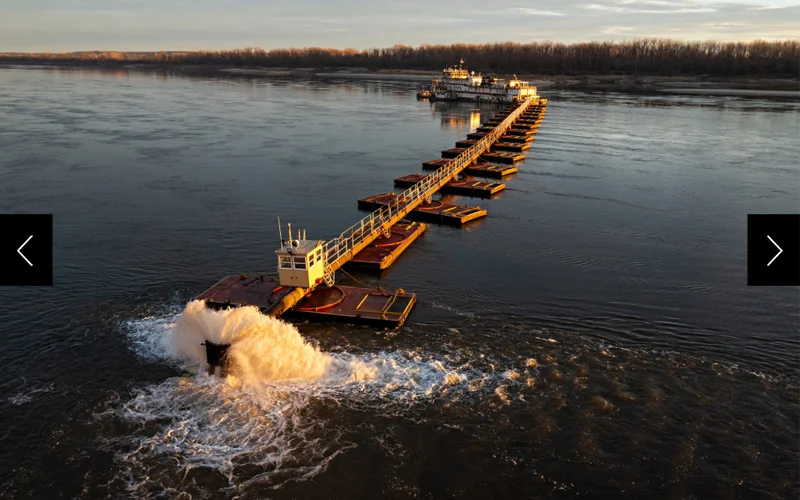 A boat called the Dredge Potter and an 800-foot vacuum system removes sediment from the Mississippi river.