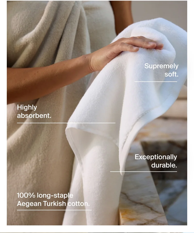 Close up of towels with product benefits. High absorbent, supremely soft, exceptionally durable, and 100% long-staple Aegean Turkish Cotton.