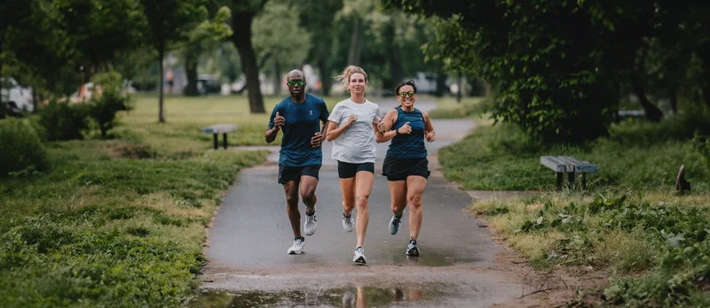 Three people running