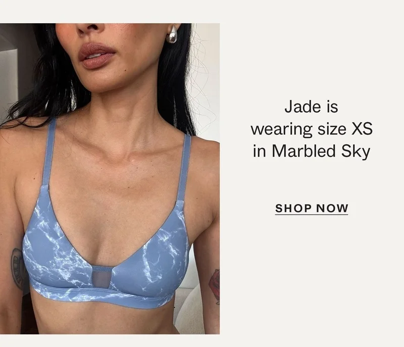 Jade is wearing size XS in Marbled Sky