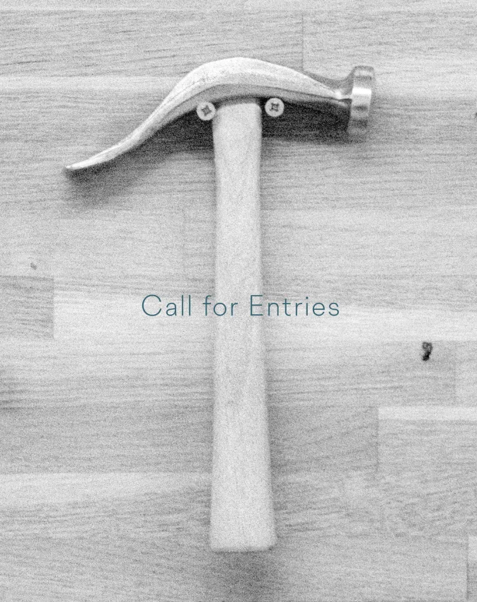Image of an hammer superimposed with "Call for Entries"