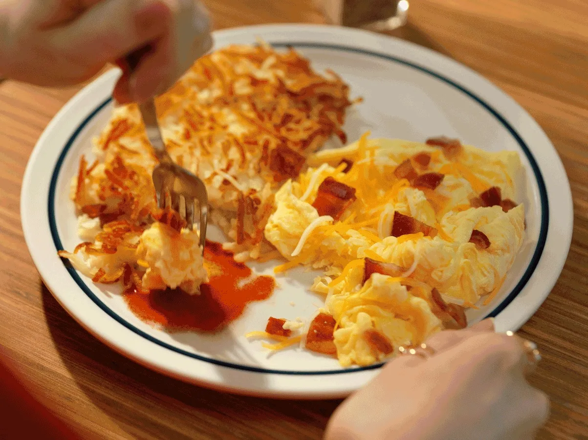 A GIF that cycles through pictures of each Value Menu item, including the House Scramble and Breakfast Faves Combo.