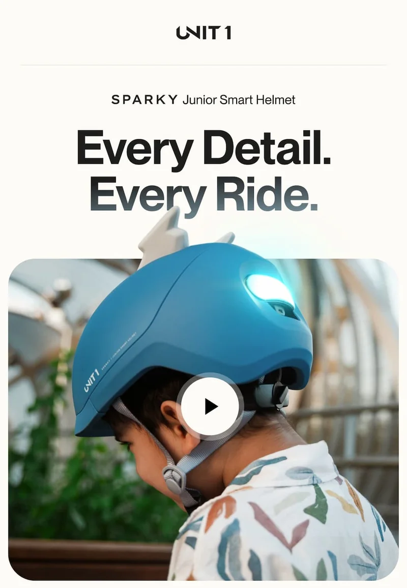 Child wearing the SPARKY Junior Smart Helmet with lights on. Tagline: Every Detail. Every Ride.