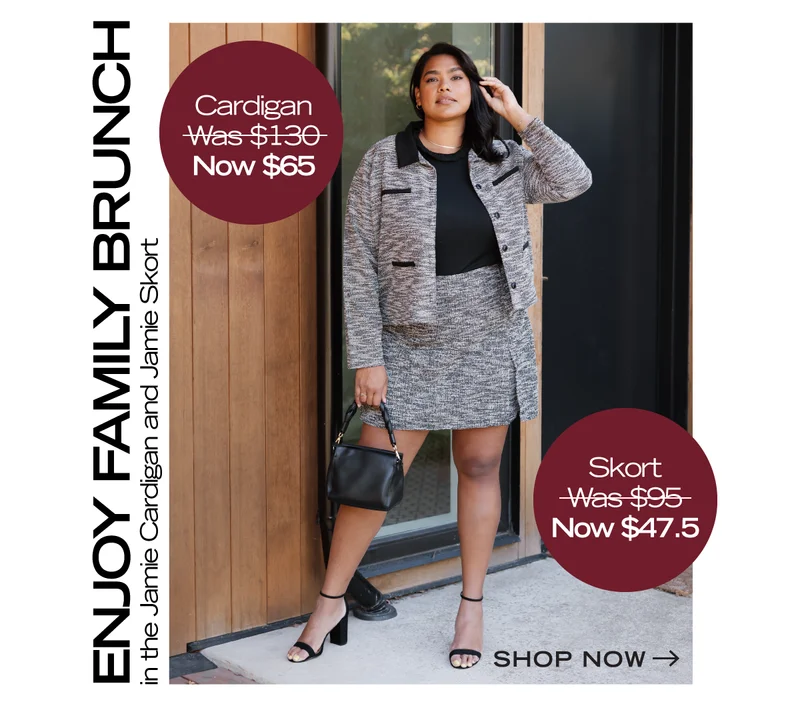 brunette wearing grey suit cardigan and skirt