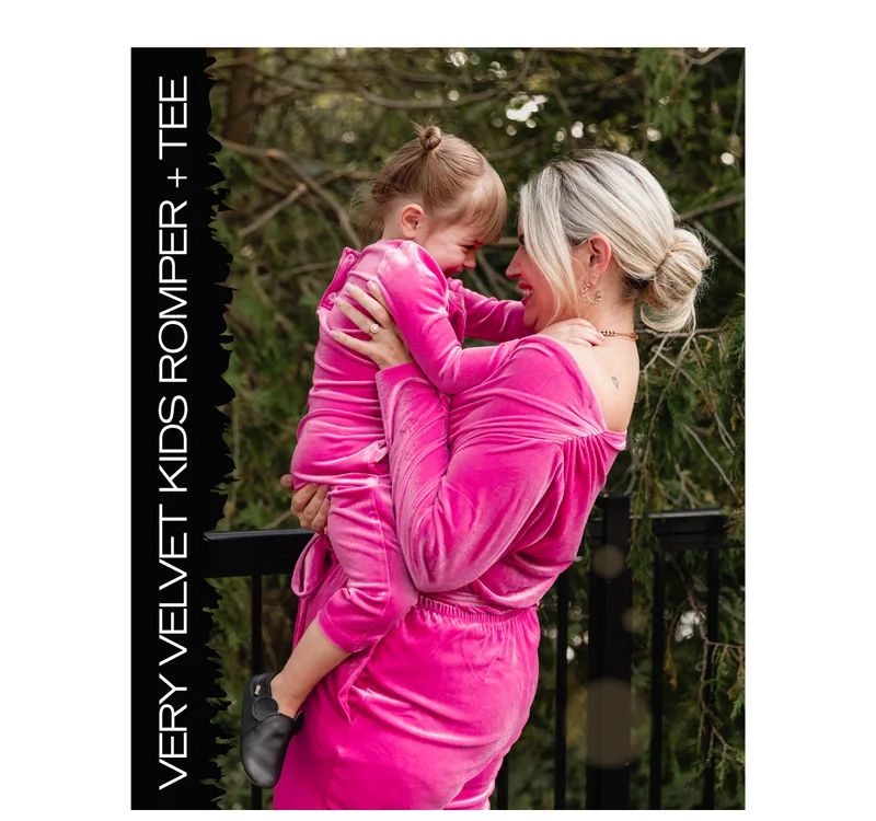 mom and daughter wearing matching pink velvet rompers