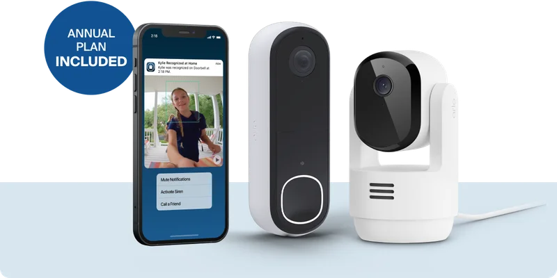 Annual plan included! Phone displaying a simulated screen image of an Arlo Secure notification next to an Arlo Video Doorbell and Arlo Pan Tilt Indoor Security Camera.