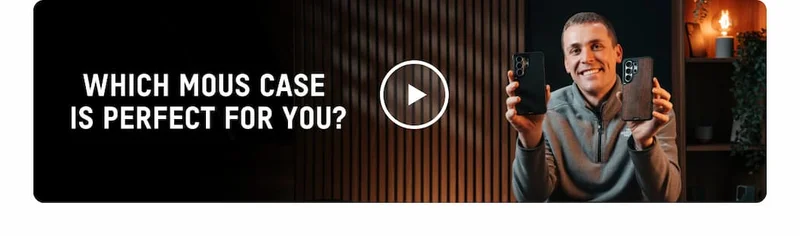 an image of a man holding a cell phone in his hand
