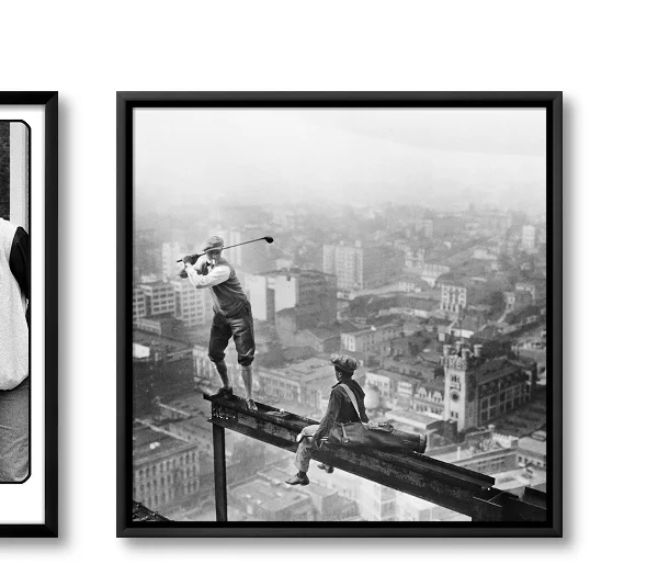 Golfer Teeing off on Girder High above City