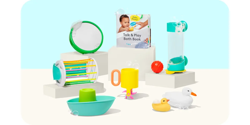 an image of a baby's bath room with toys and books