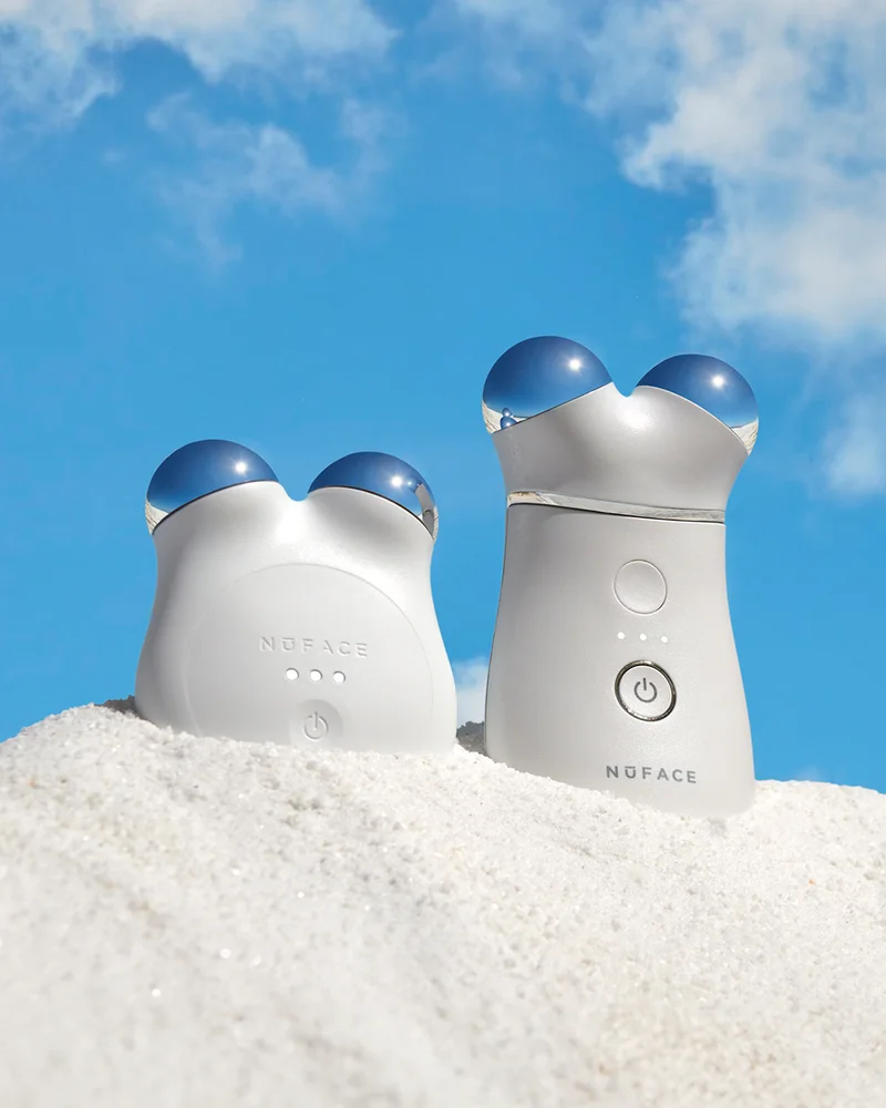 TRINITY+ and MINI+ in Brilliant White shown in the sand against a bright blue sky