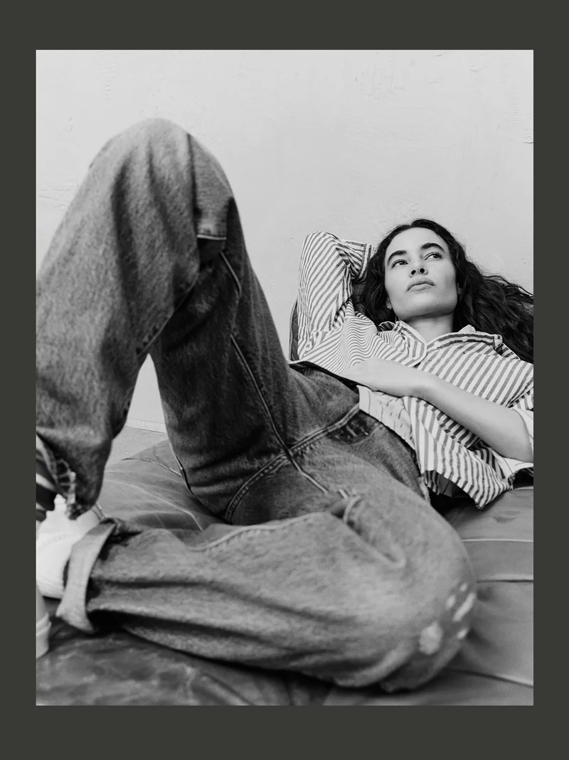 Black and white image of a person laying down