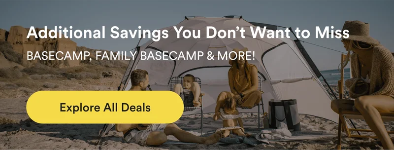 A family utilizing the Family Basecamp on the beach