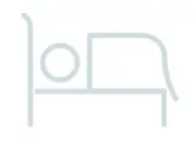 An icon of a person sleeping in a bed.