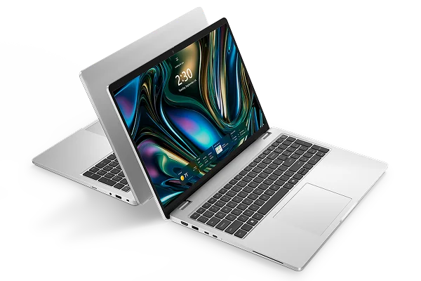 Two Dell Pro 16 Plus Laptop computers sitting back-to-back on a dark gray background.