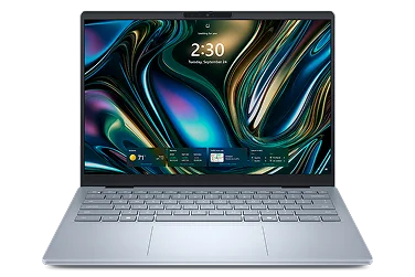 A Dell laptop computer on a dark gray background.