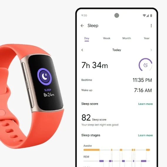 A orange Fitbit device showing sleep data on the screen. It is sitting next to a Pixel phone with Fitbit’s sleep data pulled up on the screen.