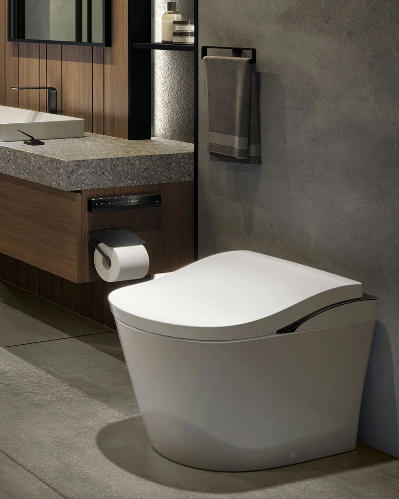 A TOTO NEOREST LS with a matte black trim sits in a modern bathroom.