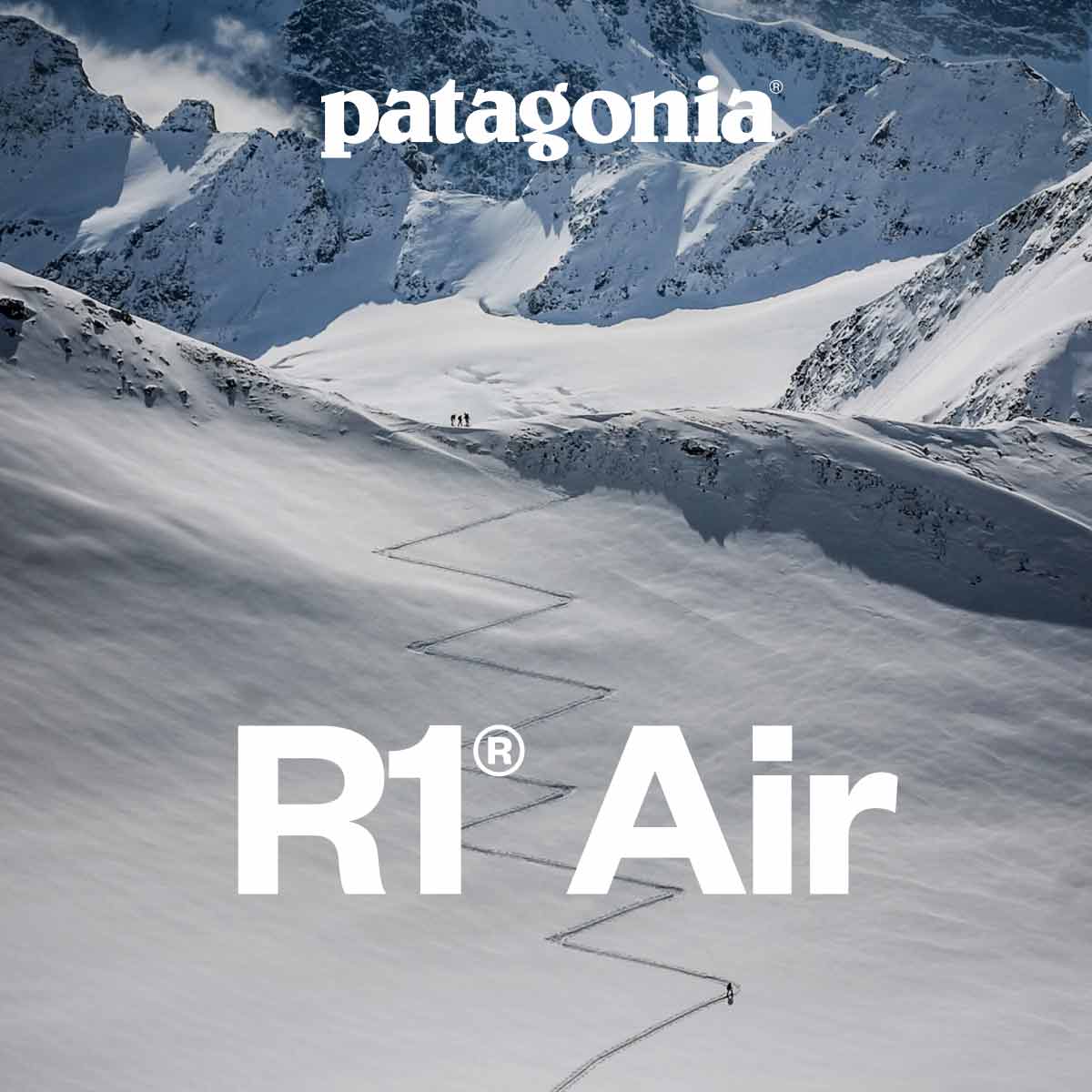 Patagonia. A skier ascends a zig-zag skintrack up to where three more skiers wait atop a gentle ridgeline.