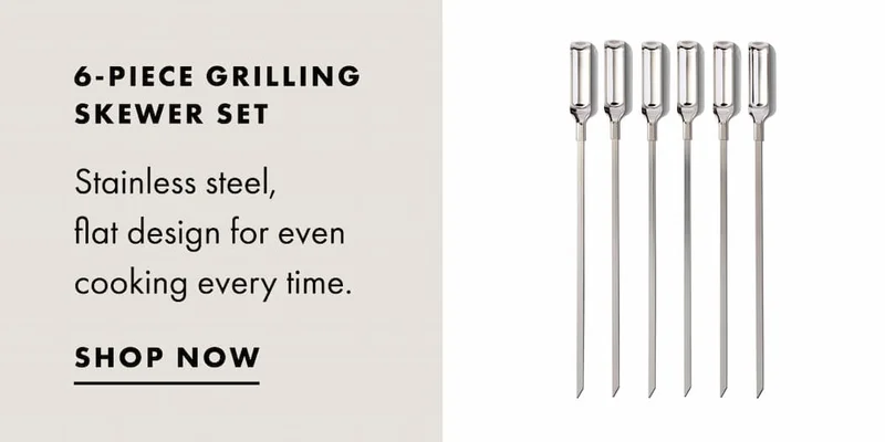 6-PIECE GRILLING SKEWER SET. Stainless steel,  flat design for even cooking every time. | SHOP NOW