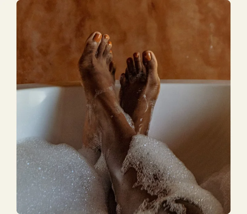 Person in a bubble bath