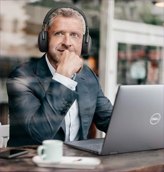 Businessman Using WL7024 Dell Premier Wireless ANC Headset