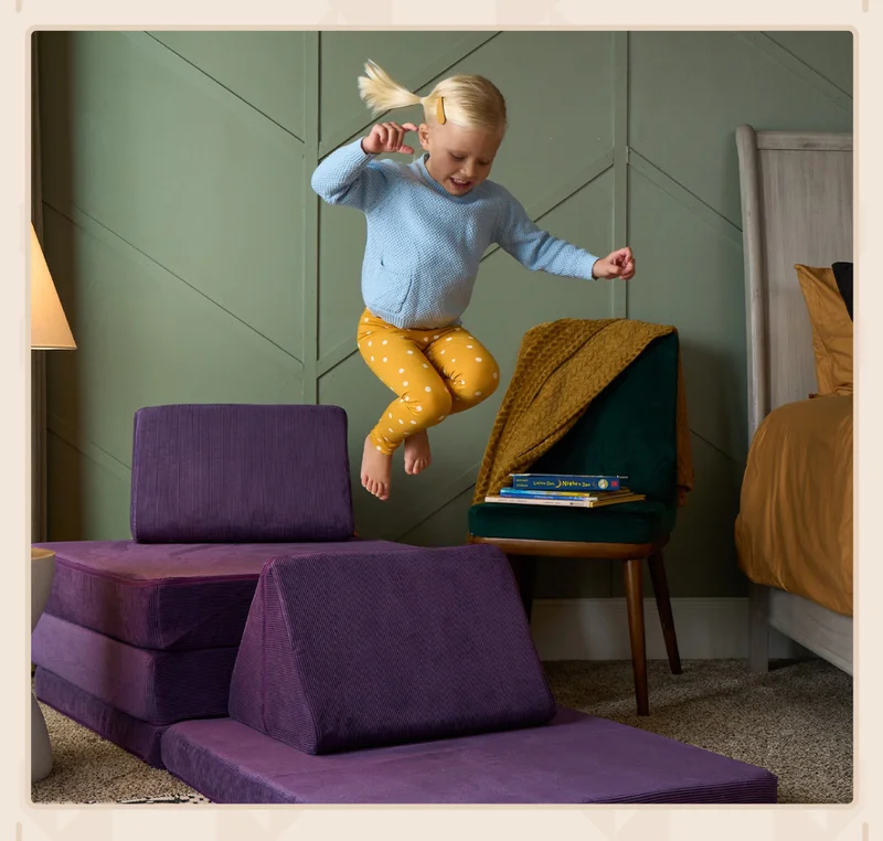 A child jumps on their new Sugarplum Nugget