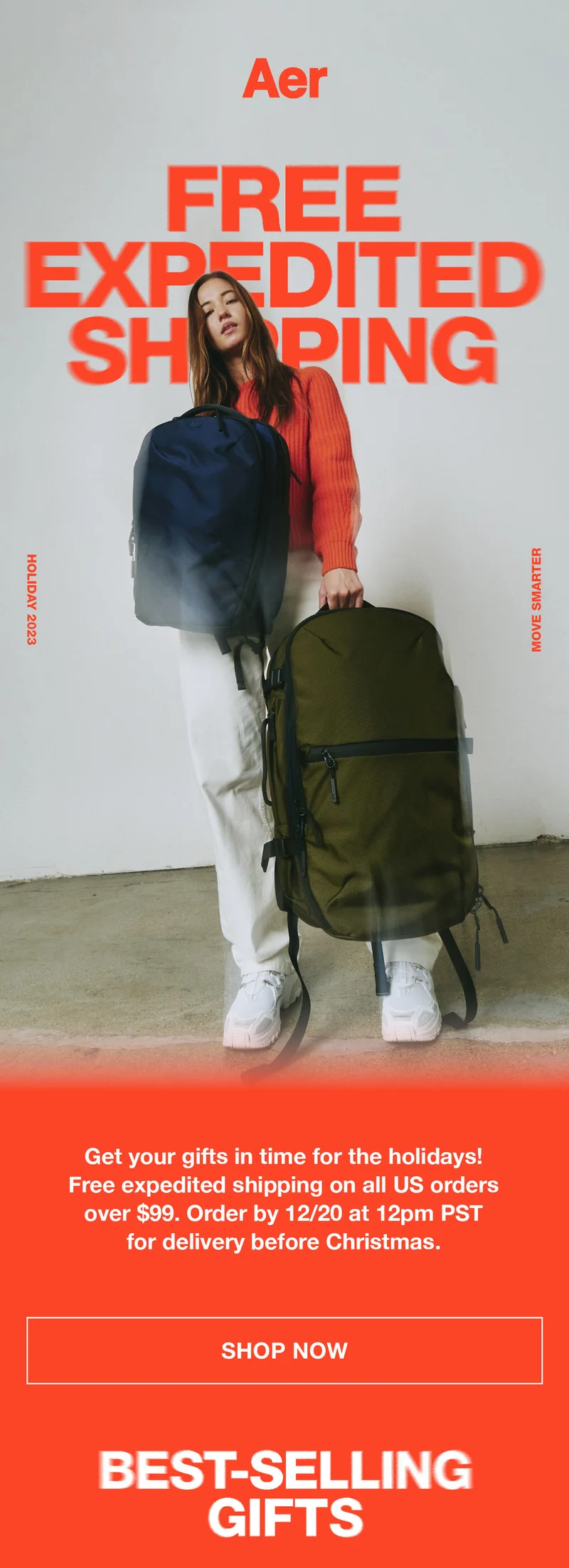Woman modeling Aer backpacks for the holidays