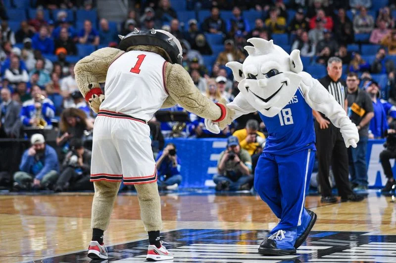 Image may contain: Teddy Williams, Musashimaru Kōyō, Bill Kenney, Christian Jones, Mascot, Adult, Person, and Helmet