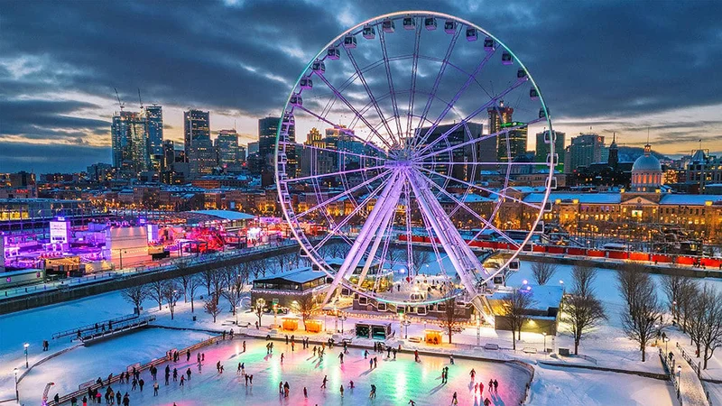 Image description: Aerial view of ferris wheel and ice skating in Montreal