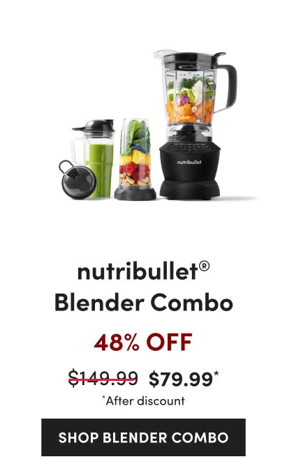 A black nutribullet blender filled with assorted vegetables next to two smaller cups.