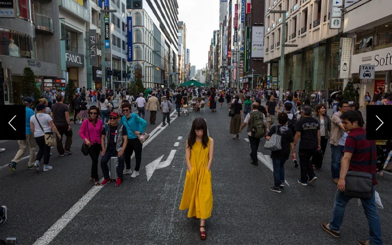 Pedestrians, shoppers, and people-watchers stroll on Chuo-dori in Ginza, one of Tokyo’s busiest destinations.