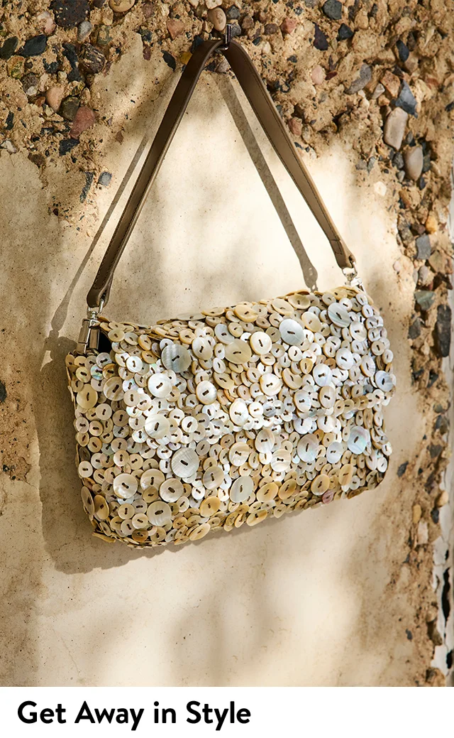 A shoulder bag covered in iridescent sequins.
