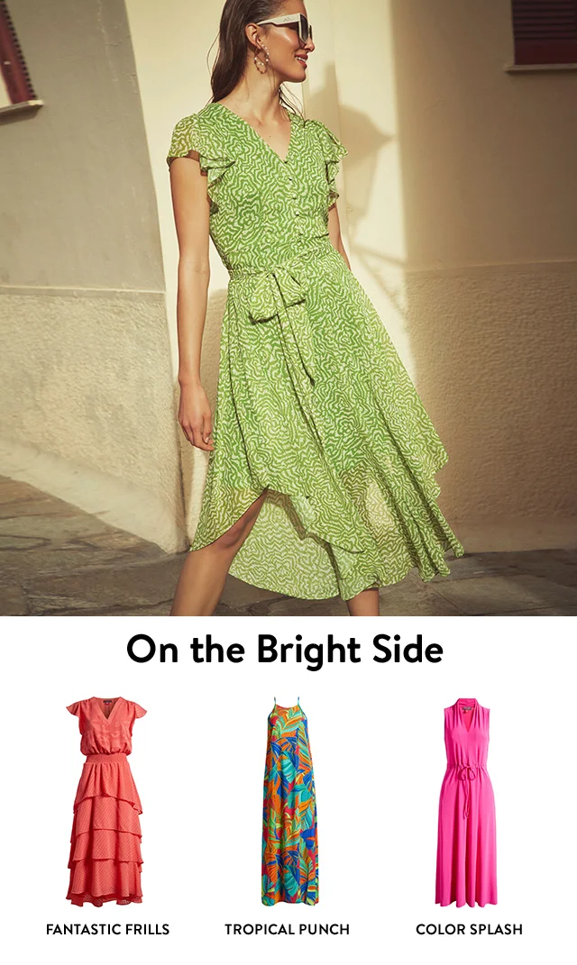 A woman wearing a printed dress. Sunny-day dresses: A tiered coral dress; a tropical-print maxi dress; a pink midi dress.