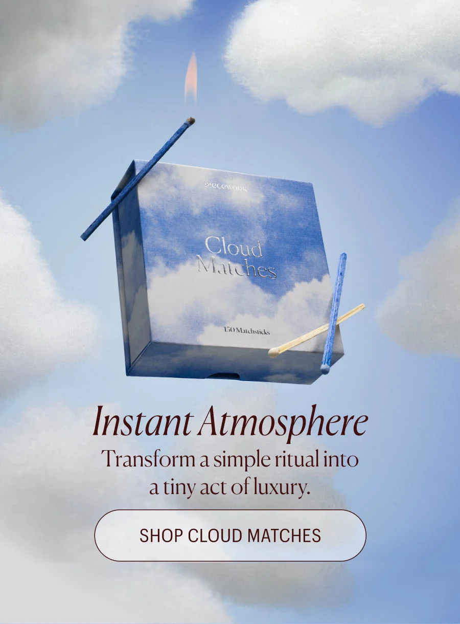 Image shows Cloud Matches box floating amongst the clouds. Instant Atmosphere: Transform a simple ritual into a tiny act of luxury. Shop Cloud Matches