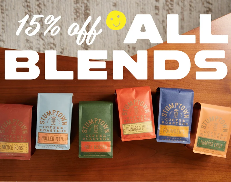 Photo of Stumptown coffee bags with the ocean in the background. Caption: 15% Off All Blends