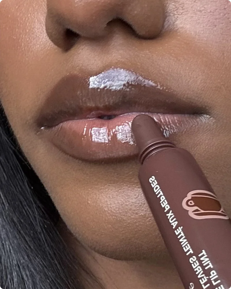 laura wears scented peptide lip tint in espresso
