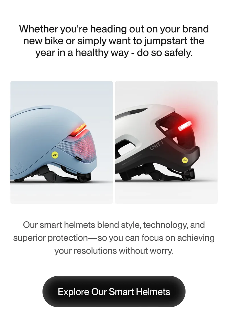 Side view of UNIT 1 smart helmets in blue and white, showcasing rear lights and MIPS technology. Innovative design for active safety.