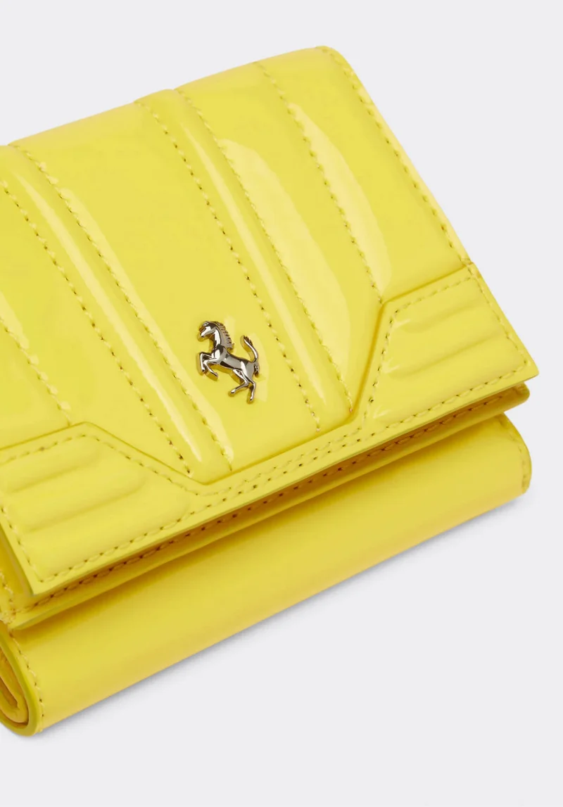Selection of Ferrari accessories: wallets, caps, eyewear and shoes