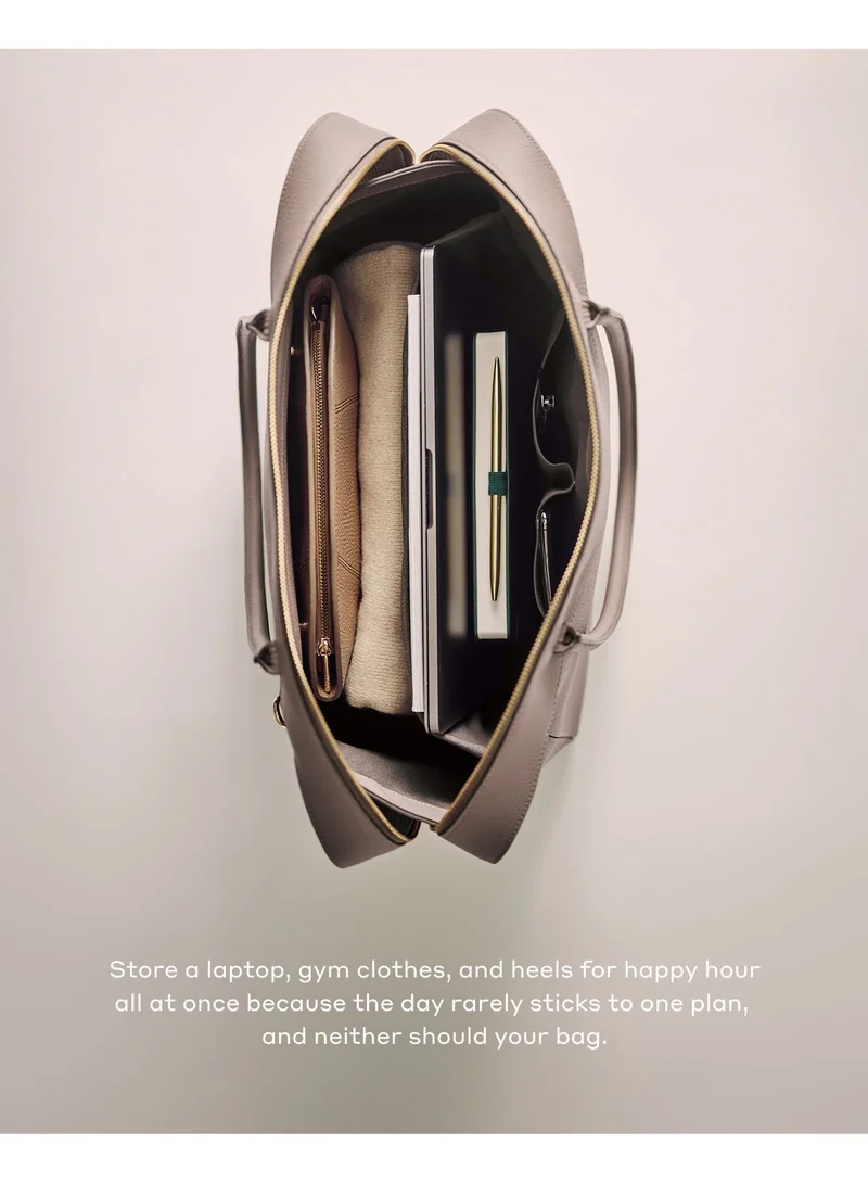 Store a laptop, gym clothes, and heels for happy hour all at once because the day rarely sticks to one plan, and neither should your bag.
