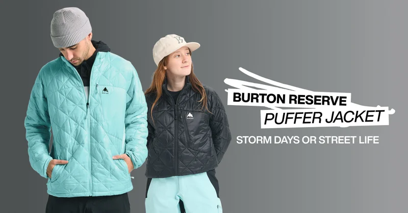 Male and female model on the left wearing the Burton Reserve Puffer Jacket in blue and black with the text 'Storm Days or Street Life' on the right