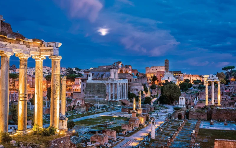 A hub of temples and public buildings, this site was the city’s political center throughout the history of Rome. In the foreground are the columns of the Temple of Saturn, which housed the public treasury.