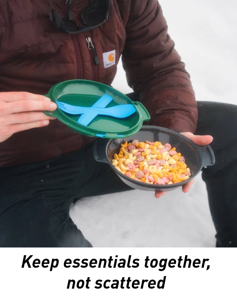 GiKit with cereal in bowl, with spoon, fork, knife, and toothpick all attached together. "Keep Essentials together, not scattered"