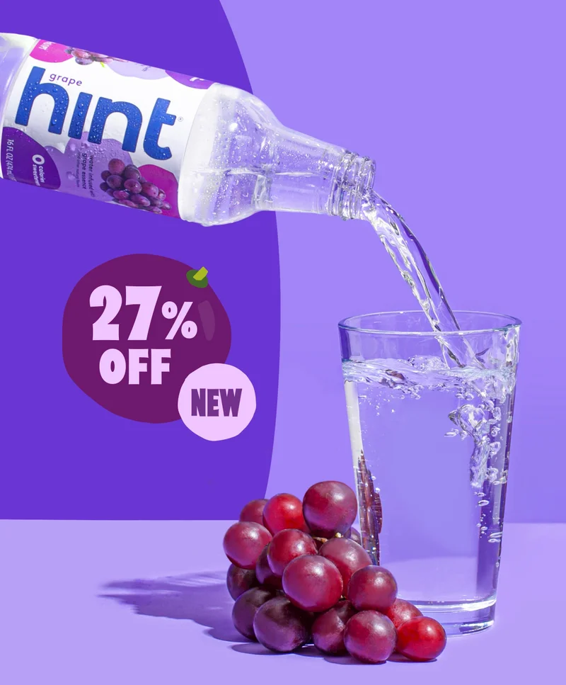 Grape Hint pouring into a glass.