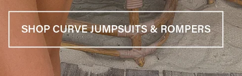 White banner 'SHOP CURVE JUMPSUITS & ROMPERS' over a person's leg and textured ground, encouraging exploration of trendy plus size styles.