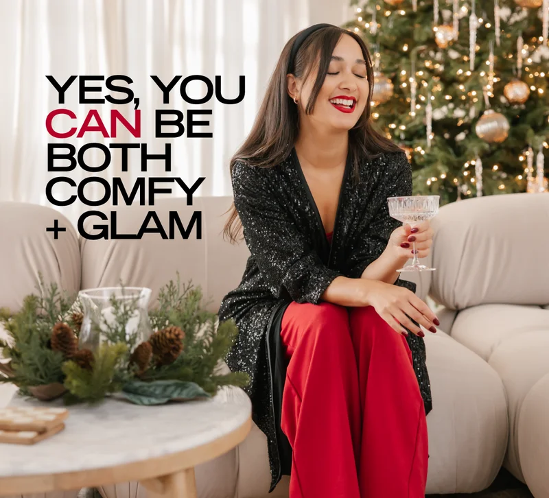 jillian harris wearing green shay romper next to christmas trees