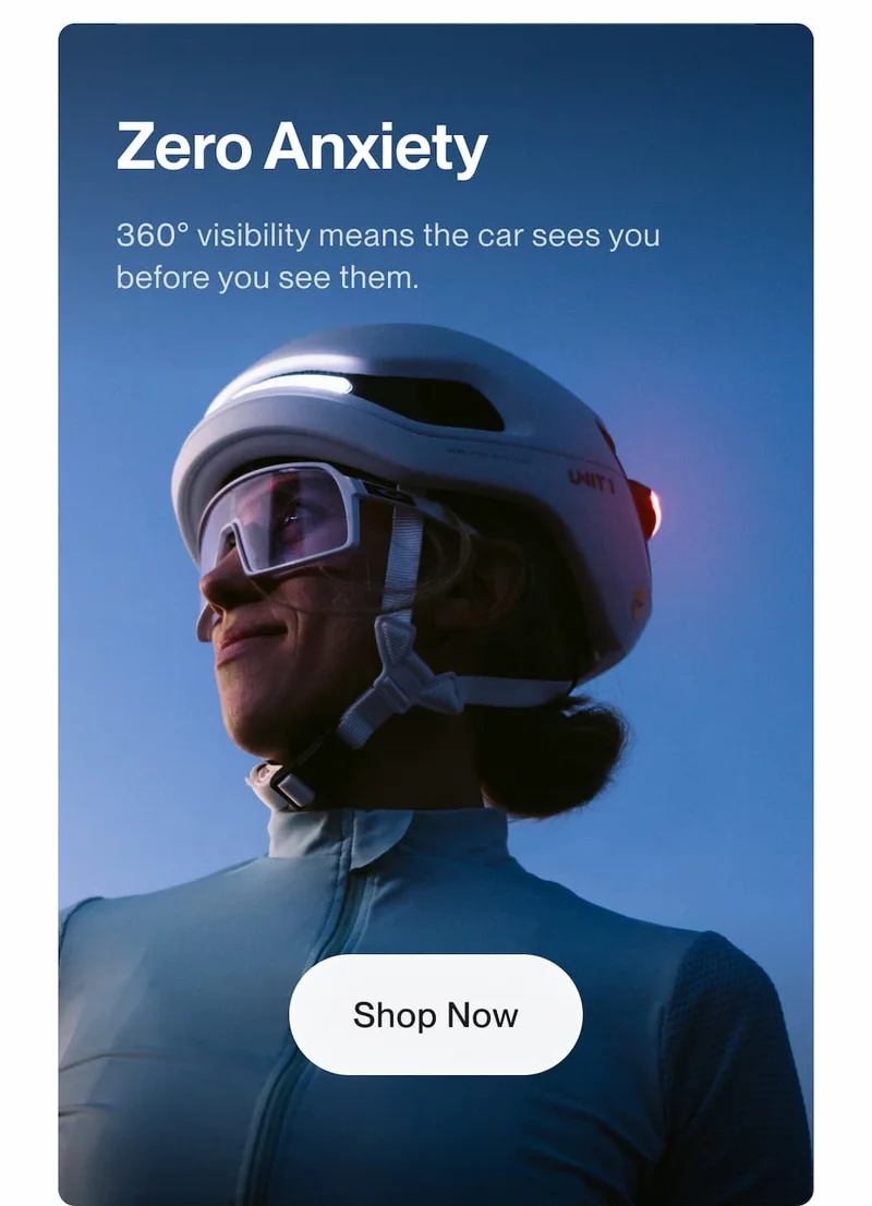 Cyclist wearing a UNIT 1 smart helmet emphasizing 360 degree visibility with the headline Zero Anxiety.