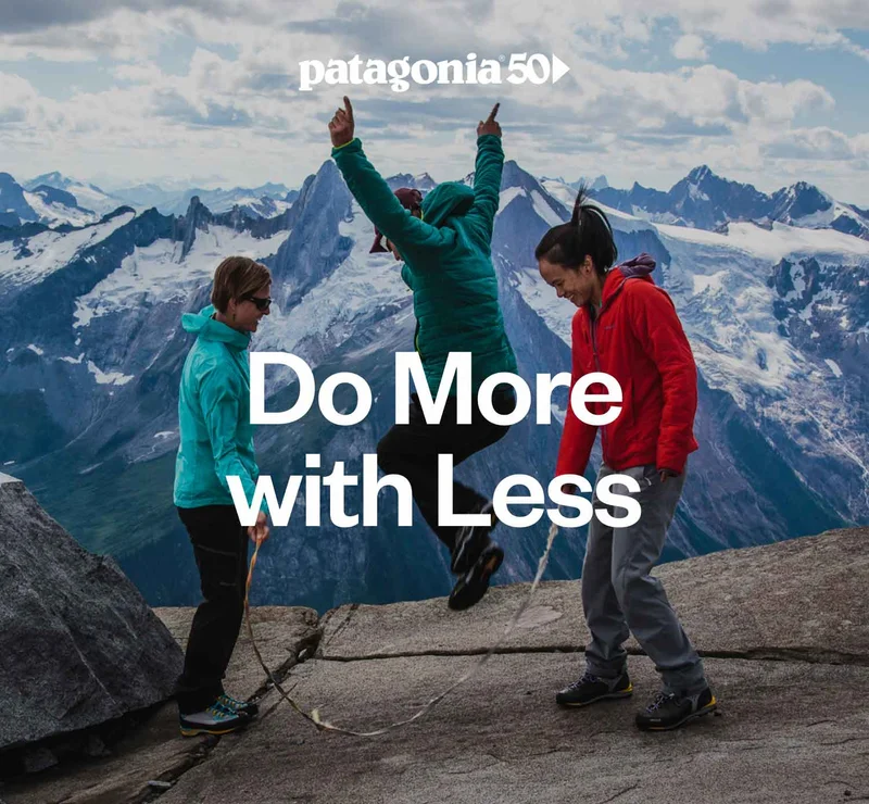 Patagonia 50. Do more with less. A climbing party jumps rope up high in the mountains.