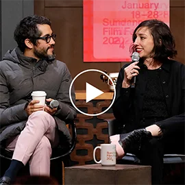 Carlos Lopez Estrada and Lana Wilson speaking at a panel.